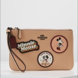 Coach Minnie Mouse exclusive wristlet.